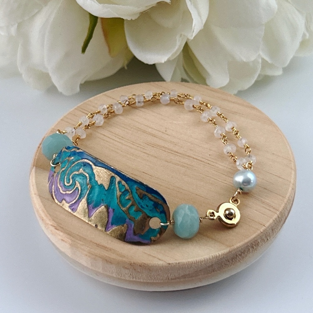 Elegant Gold and Blue Bracelet